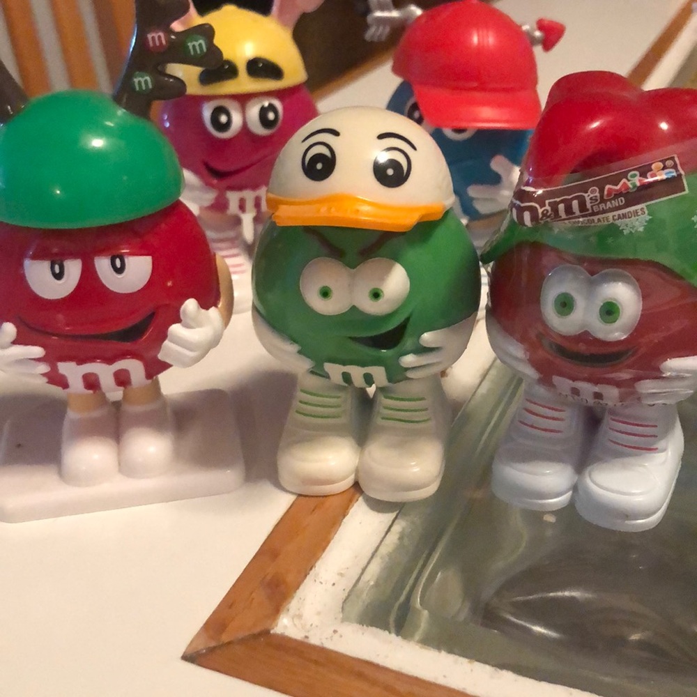 Collectible M&M people wearing assorted hats. - Picture 5 of 6
